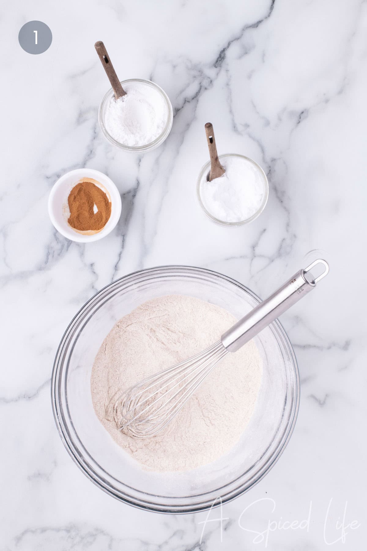 Step 1: Whisking together flour, baking powder, baking soda, cinnamon, and salt