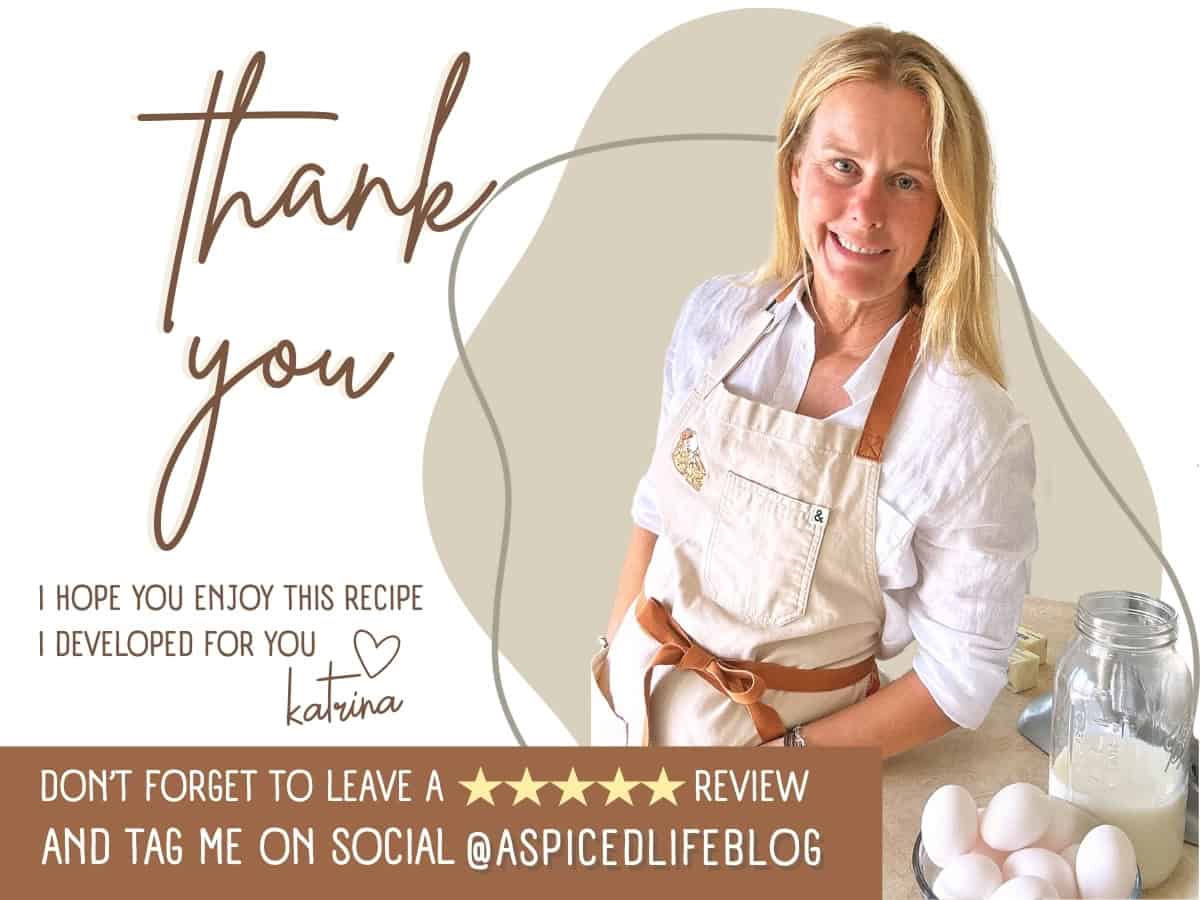 Food blogger Katrina from A Spiced Life smiling in her kitchen, wearing a beige apron, with eggs and a jar of milk on the counter, next to a thank you message for readers.