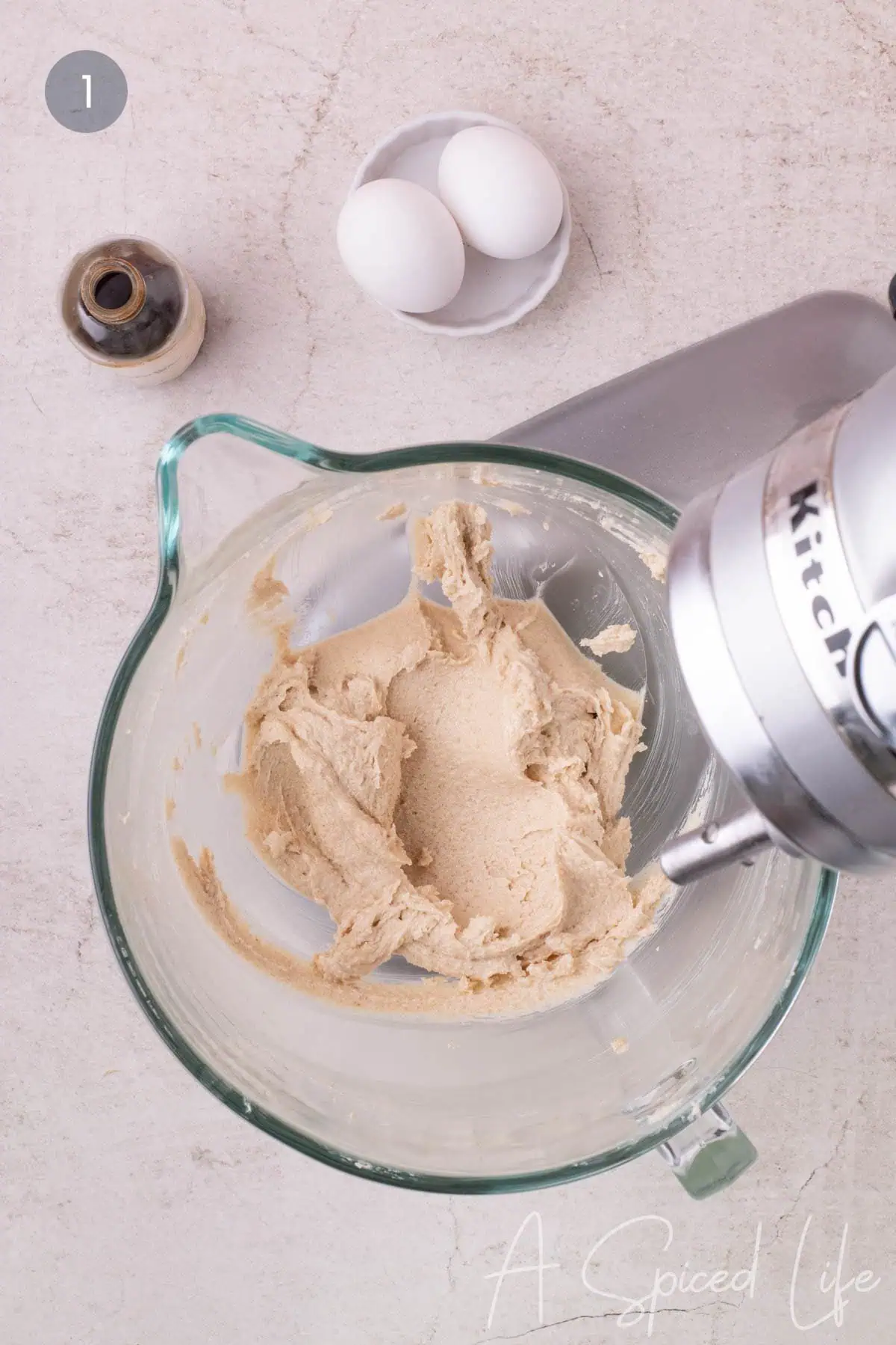 Creaming butter and sugars for heart shaped cookie cake dough