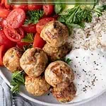 Turkey feta meatballs cooked in an air fryer basket