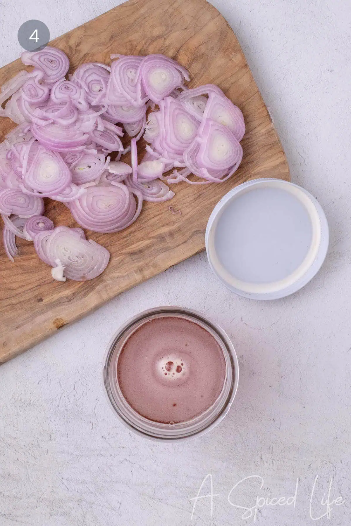 Adding sliced shallots to jar for quick pickled shallots