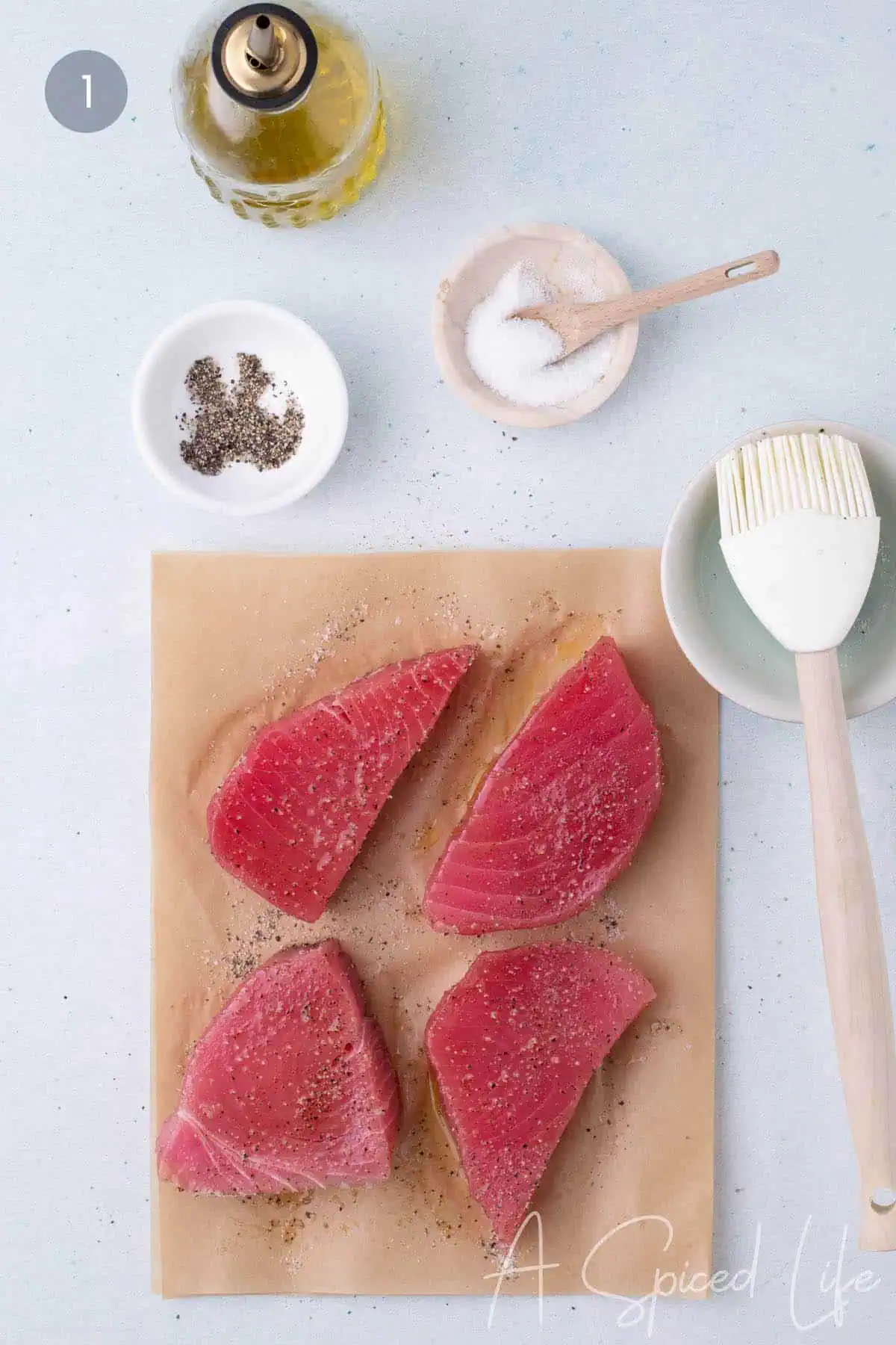 ahi tuna steaks seasoned with salt and pepper before cooking