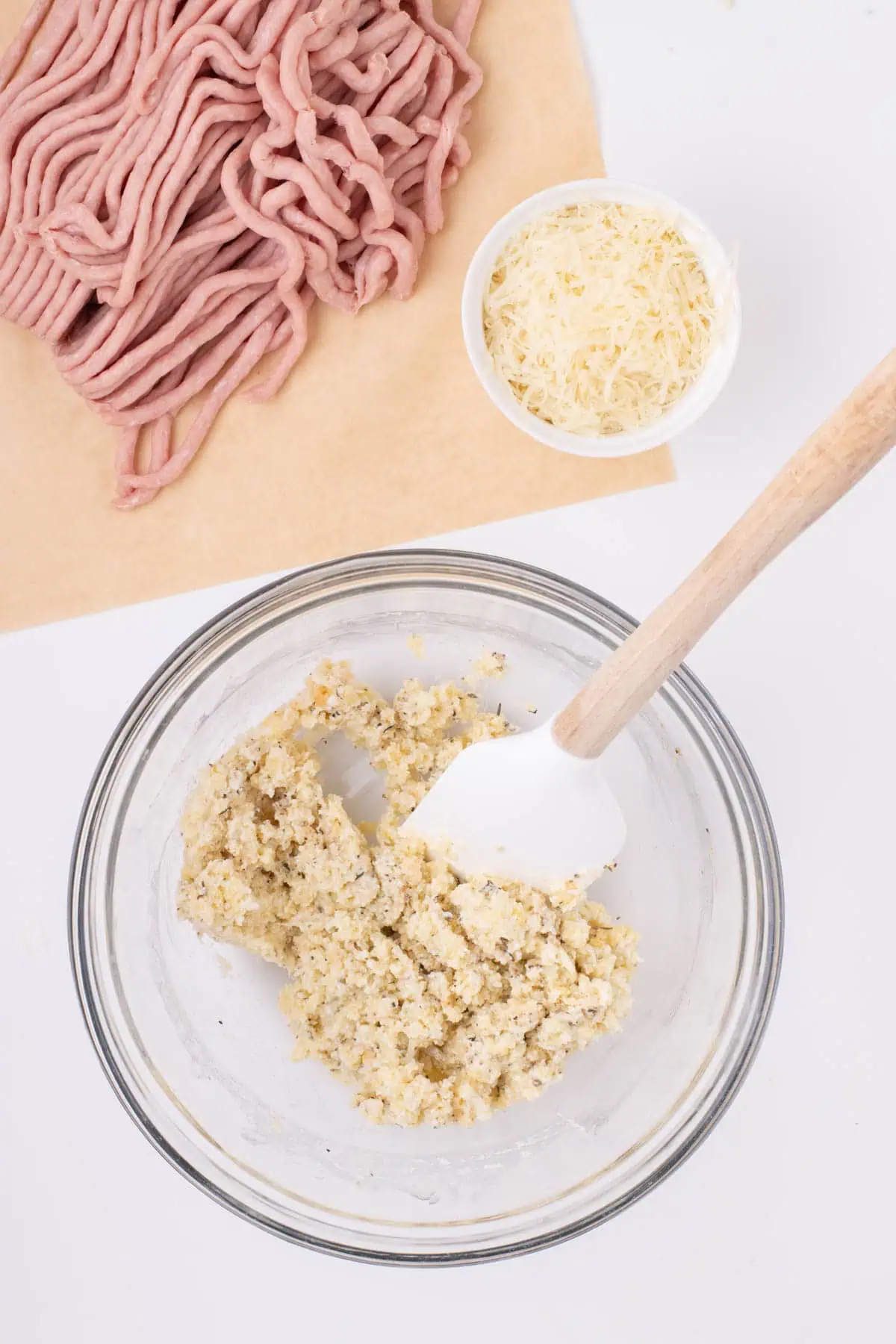 Ricotta, panko, Parmesan, garlic, onion, egg, and seasonings mixed together in a bowl.