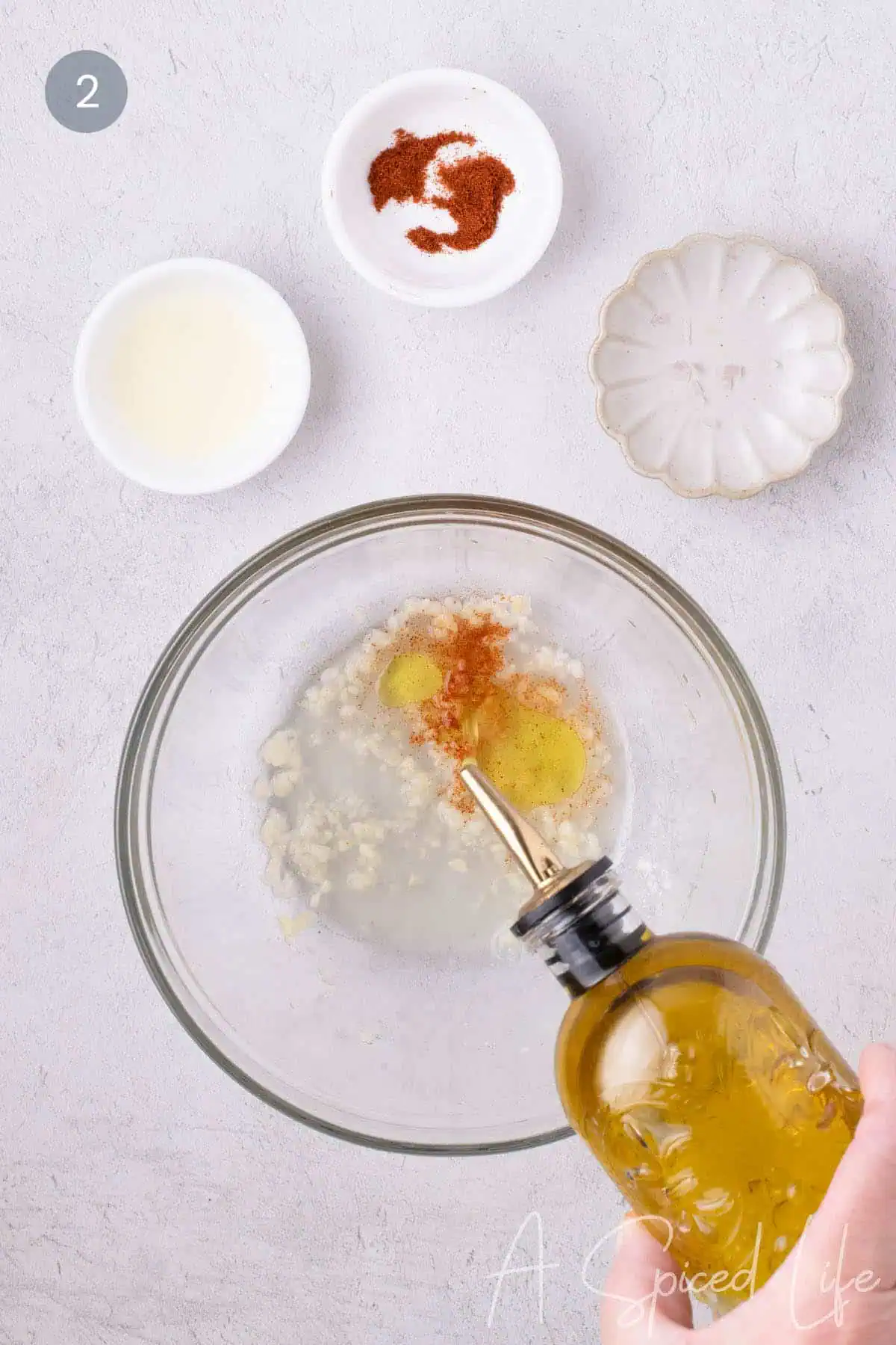 Olive oil, lemon juice, and cayenne added to the garlic base for dill dip