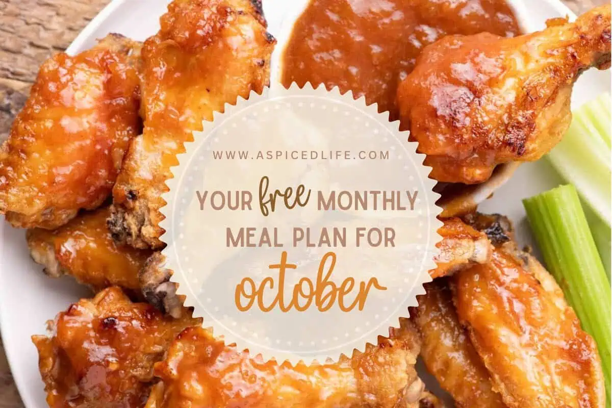 October monthly meal plan graphic over a plate of air fryer BBQ chicken wings.