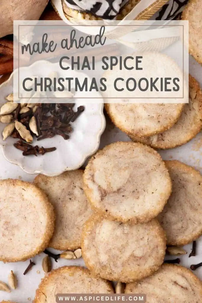 Stacked shortbread cookies showing thick golden sugar-coated edges with cinnamon and cardamom nearby.